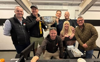 The AK Bets Betting Shop team with the Sam Maguire Cup